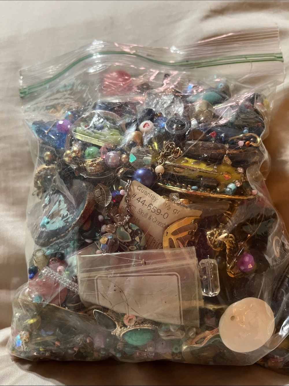 DIY Crafters Bag full of beads, centerpieces, bracelets, Etc.